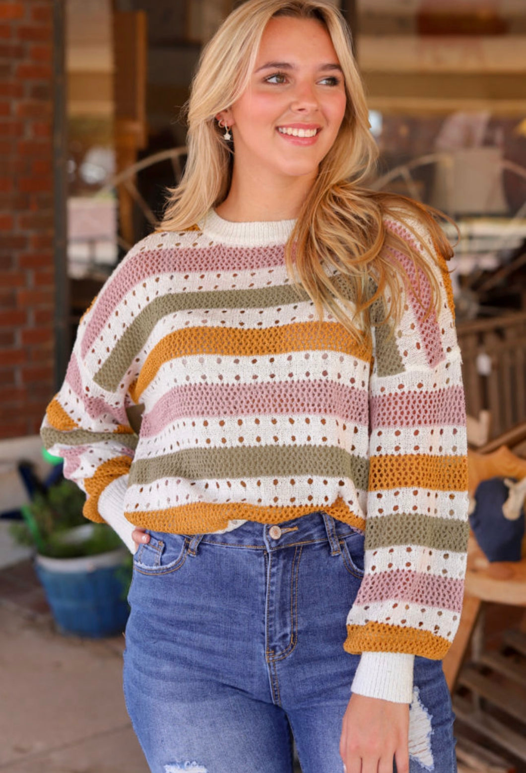 Hollowed knit sweater